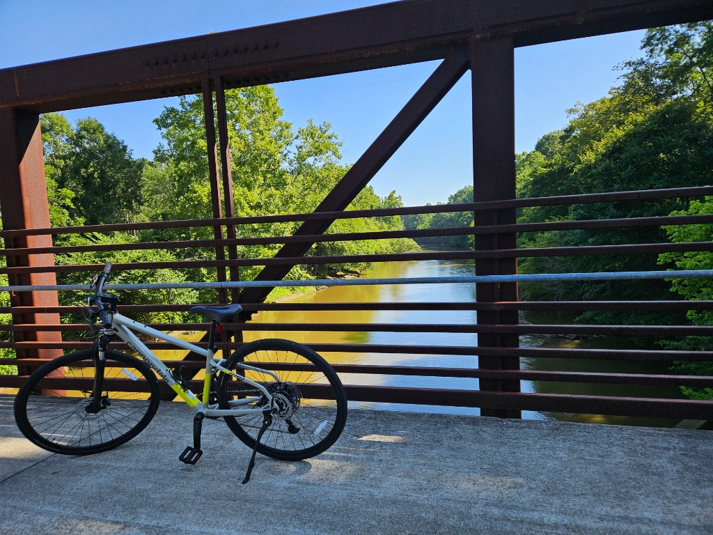 Bicycle parked on a bridge over a river near Knightdale, North Carolina